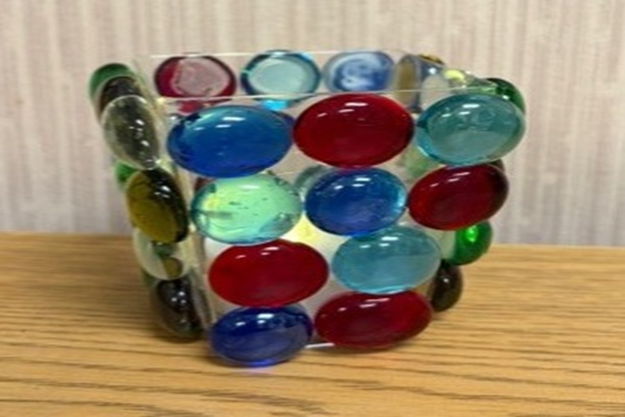 colorful glass beads glueed to a votive candle holder