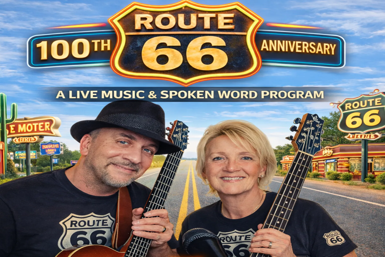 man and woman holding the neck of guitars in front of Route 66