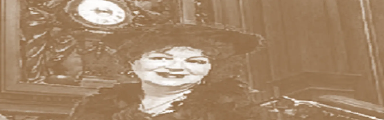 Sepia colored photo of an actress portraying Molly Brown